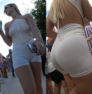 Sexy blonde girl in white shorts